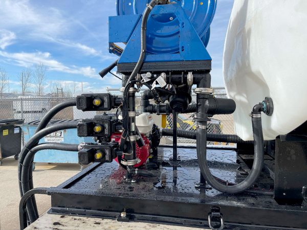 Detail of BENCO Pro Deicing truck's pump & plumbing from passenger's side