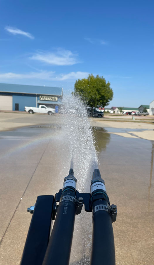 Motorized roadside nozzles pattern spraying during testing